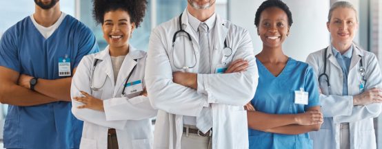 Doctor, team and hospital at work smile together for portrait in medical facility. Medic, nurse and.